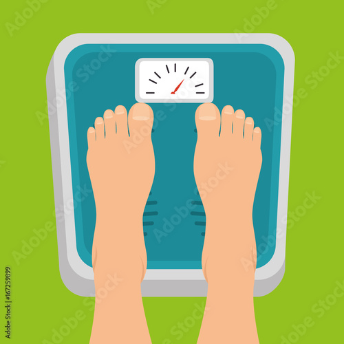 pregnant women feet standing on weight scale