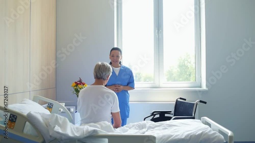 Professional doctor helping his immobile senior patient