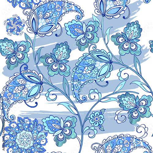 Traditional oriental seamless paisley pattern with watercolor stains. Vintage flowers seamless ornament in blue colors. Decorative ornament backdrop for fabric, textile, wrapping paper