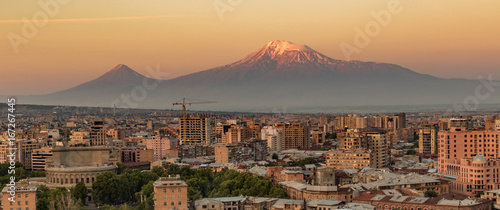 City skyline of Yerevan at sunrise, with Mt Ararat in background photo