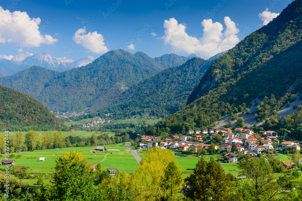 The beautiful mountain scenery. Village with mountains in the background, Most na Sochi, Slovenia.