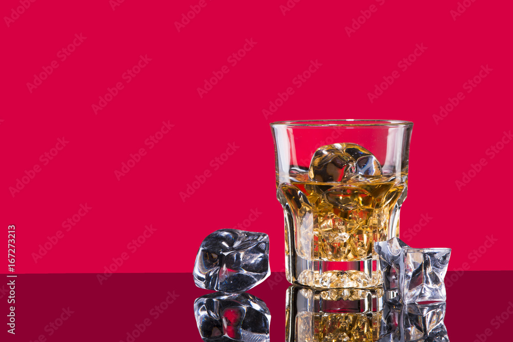 Glass of scotch whiskey and ice Glass of scotch whiskey and ice