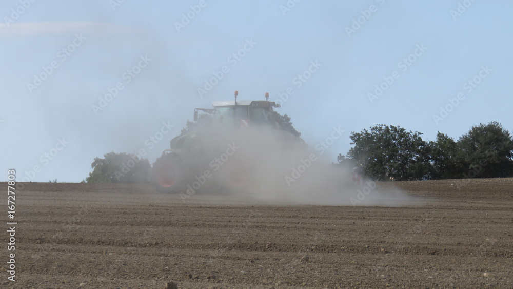 Plowing of the ground with tractor Plowing of the ground with tractor