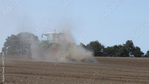 Plowing of the ground with tractor © robypangy