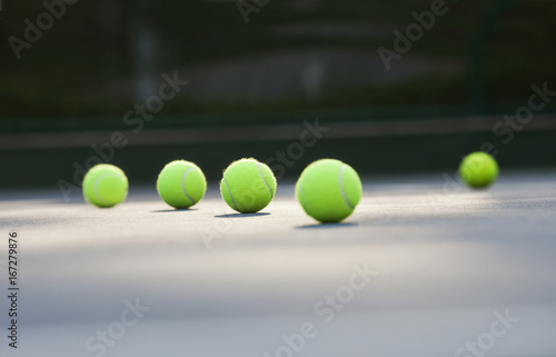 Surface level shot of tennis balls lying on ground  © IndiaPix