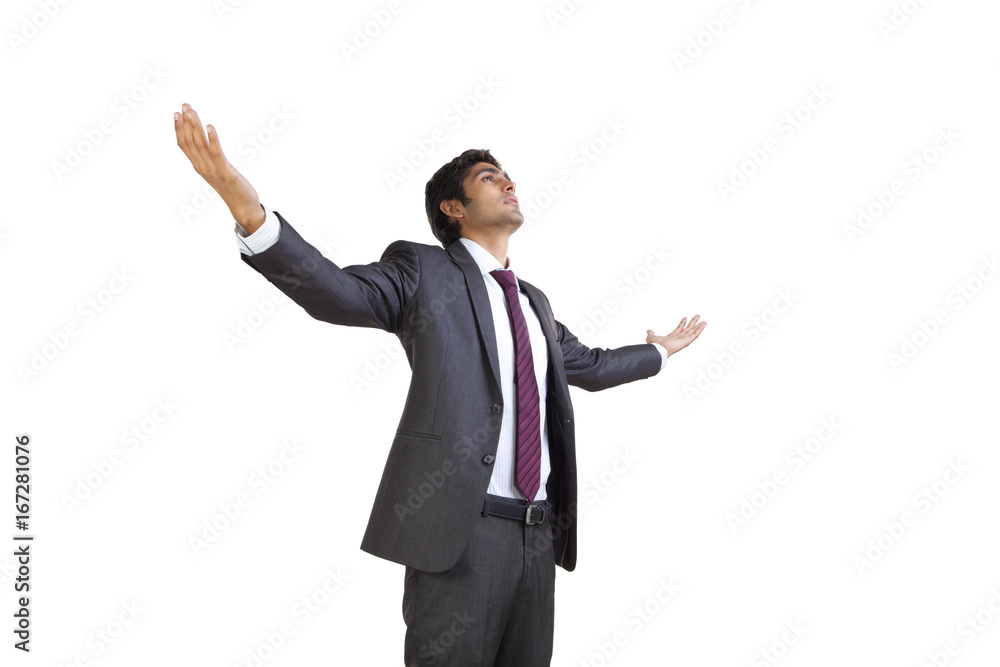 Business executive enjoying with arms outstretched Business executive enjoying with arms outstretched