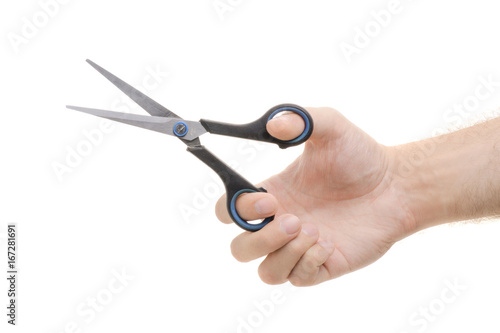 Scissors in a male hand