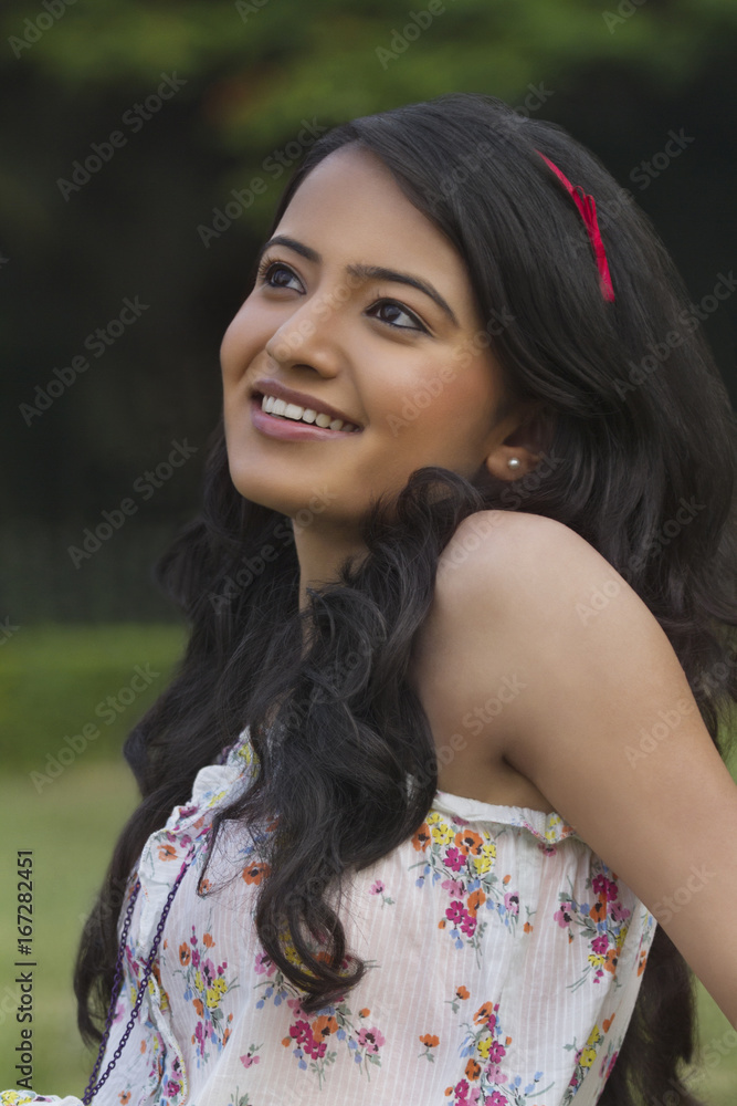 Fototapeta premium Young woman thinking 
