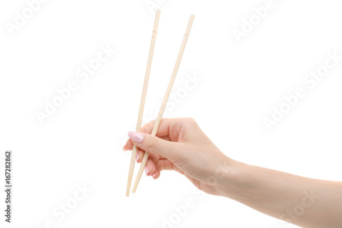 Chopsticks for sushi in a woman's hand