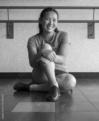 Sticker Black and white version of Smiling Teenage Jazz dancer in dance class