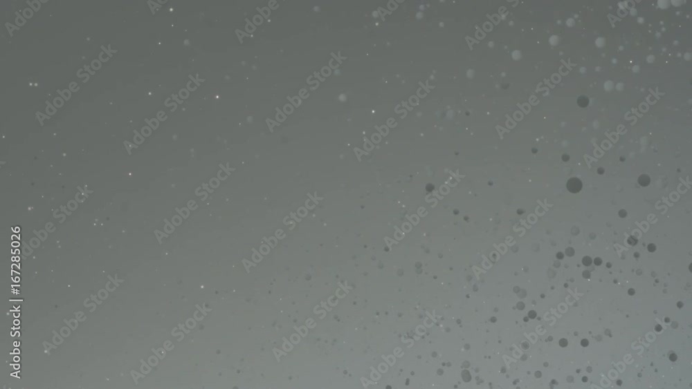 Glitter and bubbles in water, slow motion Glitter and bubbles in water, slow motion
