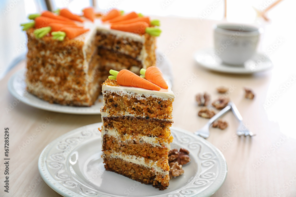Delicious sliced carrot cake on table Delicious sliced carrot cake on table