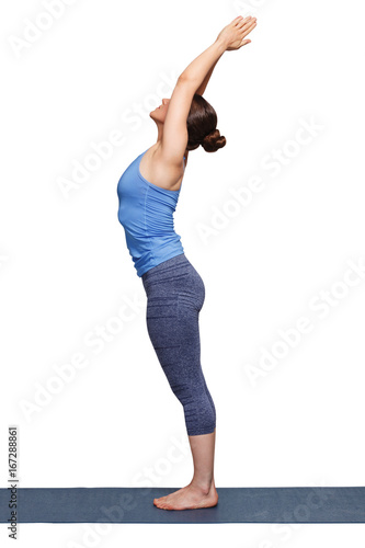 Woman doing Hatha Yoga asana Tadasana photo