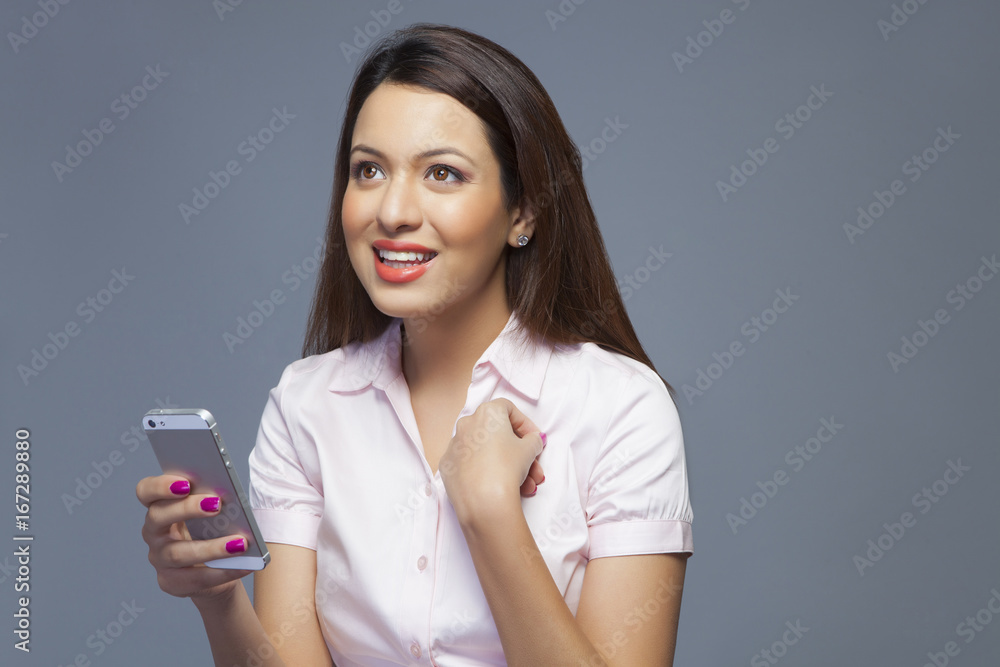 Female executive with a mobile phone Female executive with a mobile phone