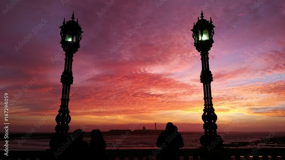 Spectacular sunset in La Caleta, Cadiz, Spain Spectacular sunset in La Caleta, Cadiz, Spain