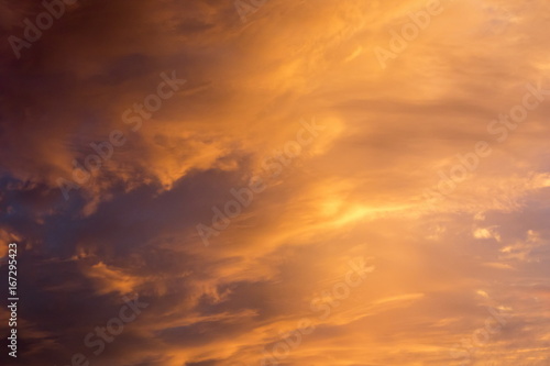 Beautiful clouds at sunset  improbable sky