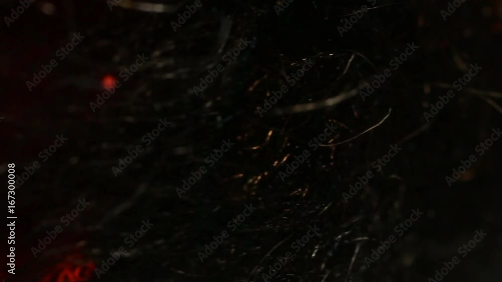 Close up, Flames burns through clump of steel wool Close up, Flames burns through clump of steel wool