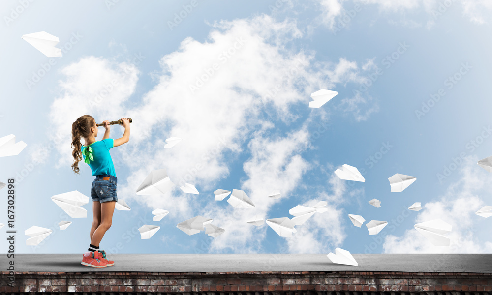 Concept of careless happy childhood with girl exploring this world Concept of careless happy childhood with girl exploring this world