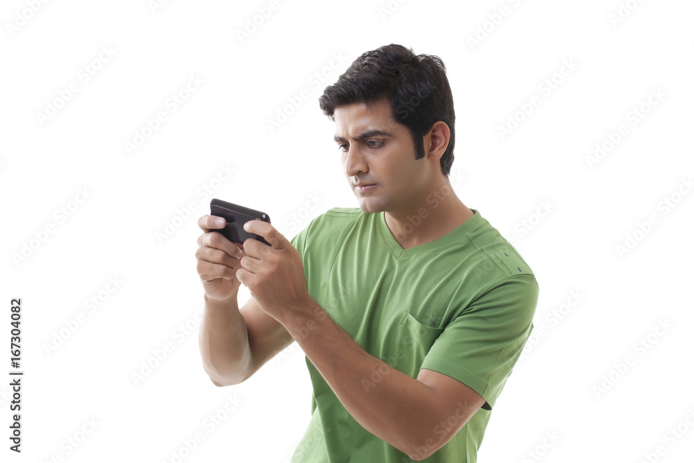 Smart guy reading text message over white background Smart guy reading text message over white background
