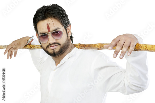Portrait of a man with a stick  photo