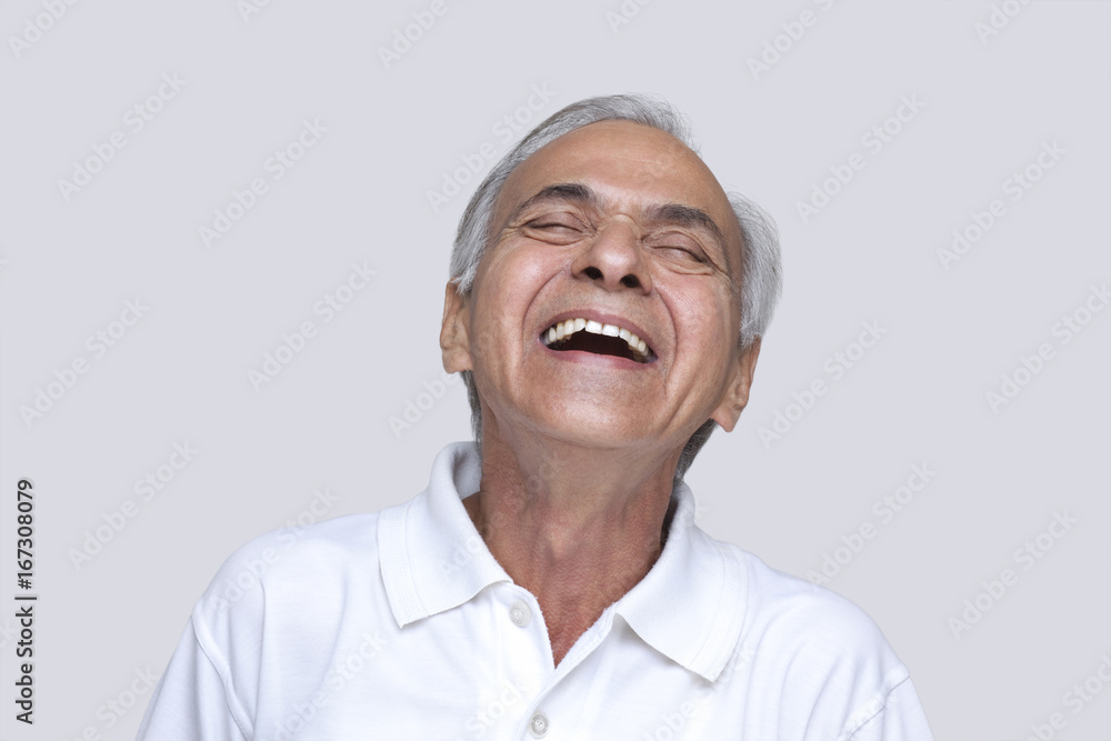 Excited man laughing with eyes closed Excited man laughing with eyes closed