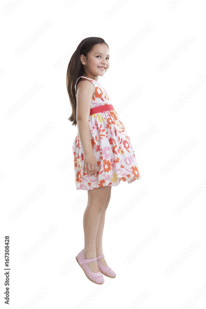 Little girl jumping in the air Little girl jumping in the air
