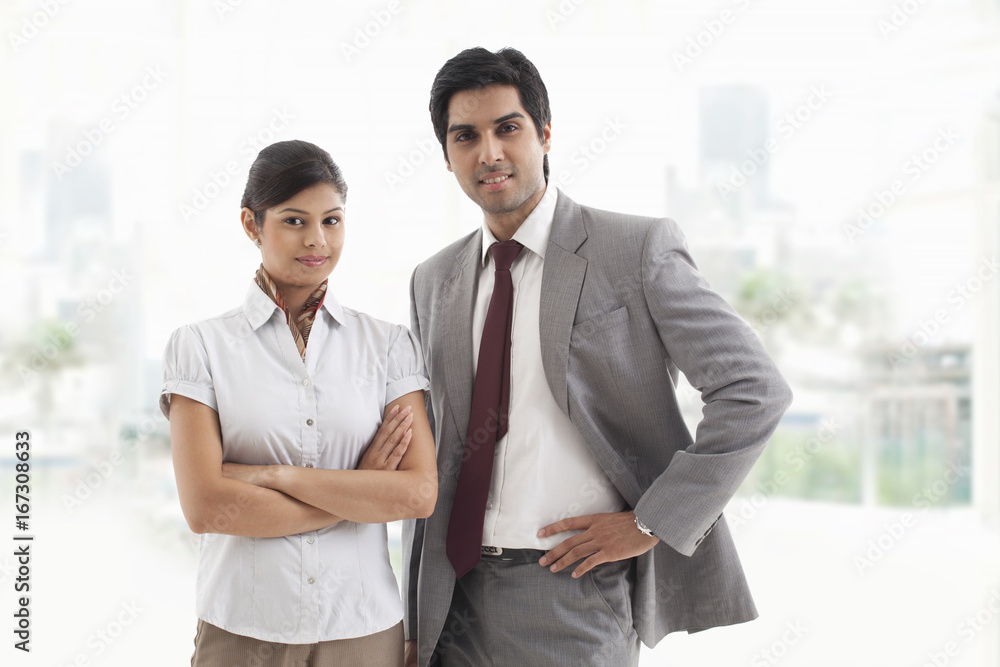 Portrait of confident business colleagues smiling together Portrait of confident business colleagues smiling together