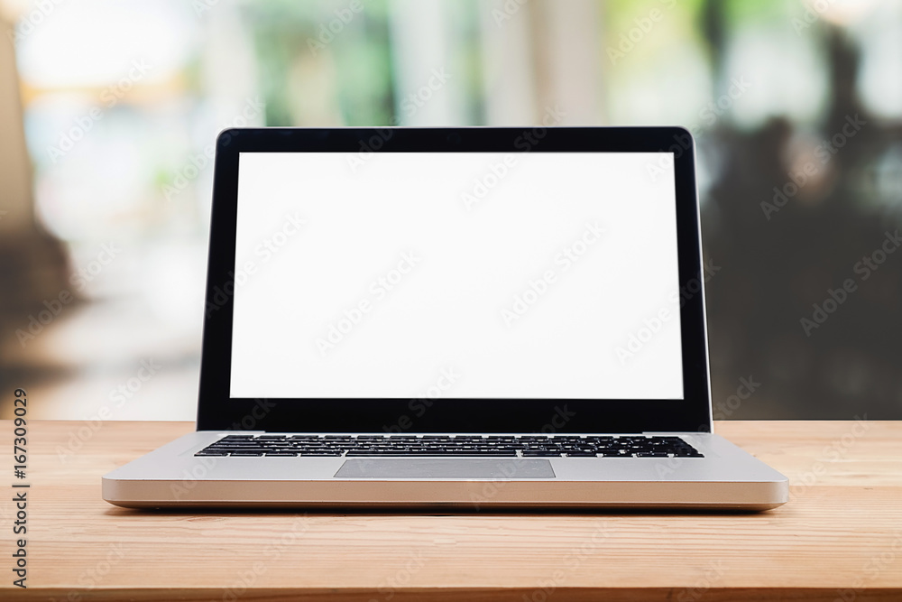 Computer with white screen on table with blur background. Technology concept. Computer with white screen on table with blur background. Technology concept.