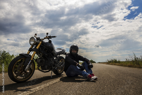 Sitting With Motorcycle