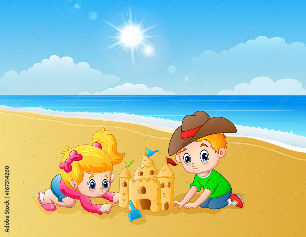 Kids making sand castle at the beach