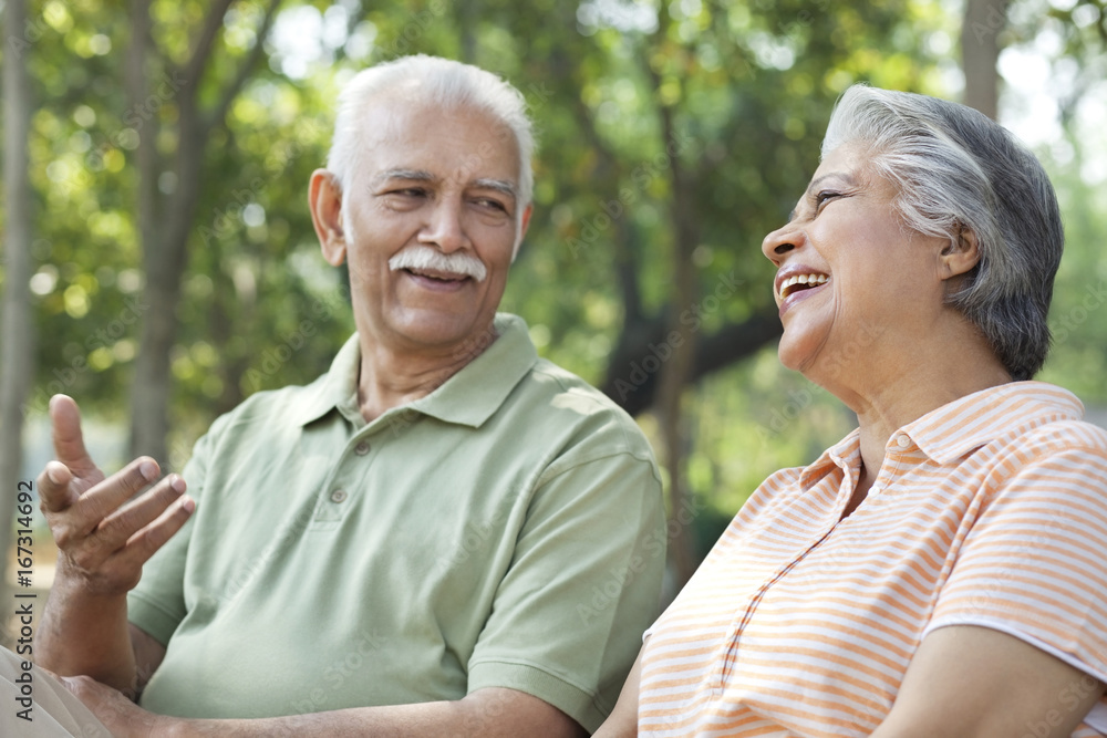 Old couple sharing a laugh Old couple sharing a laugh