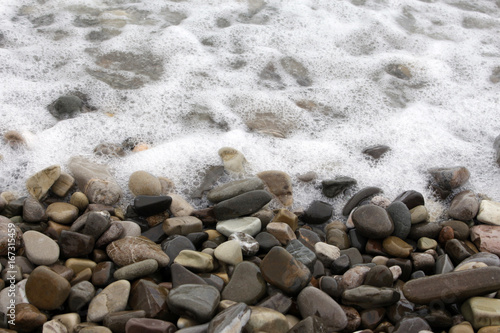 pebble beach waves lap pebble as backgroun