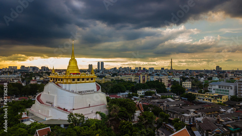   Golden Mountain    Wat Saket Ratcha Wora Maha Wihan popular Bangkok tourist attraction   Landmarks of bangkok Thailand . In the rain before   topview