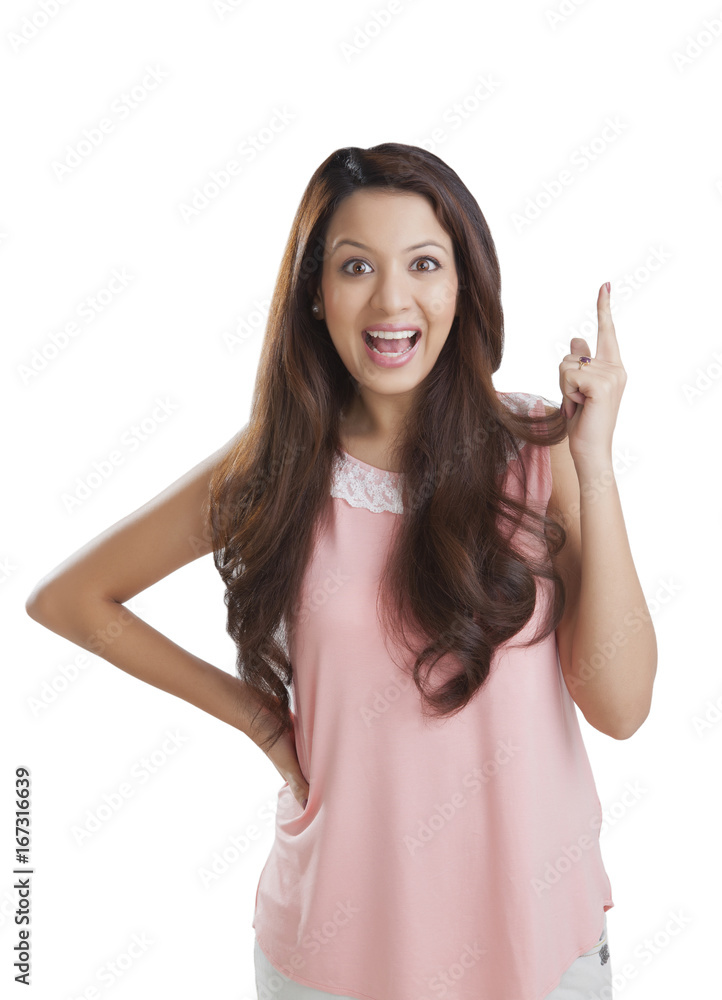 Portrait of a young woman gesturing Portrait of a young woman gesturing