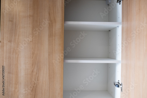 Empty open wooden shelf