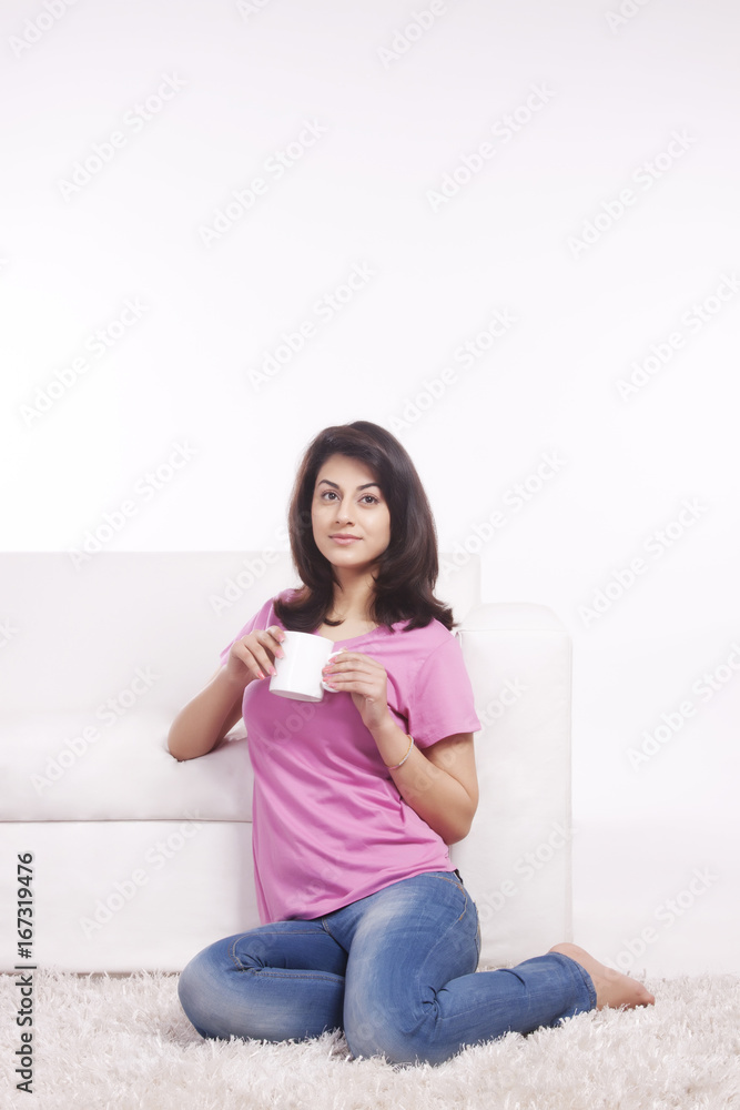 Portrait of a woman with a mug of tea Portrait of a woman with a mug of tea