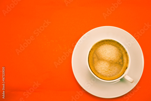 Cup of coffee on background