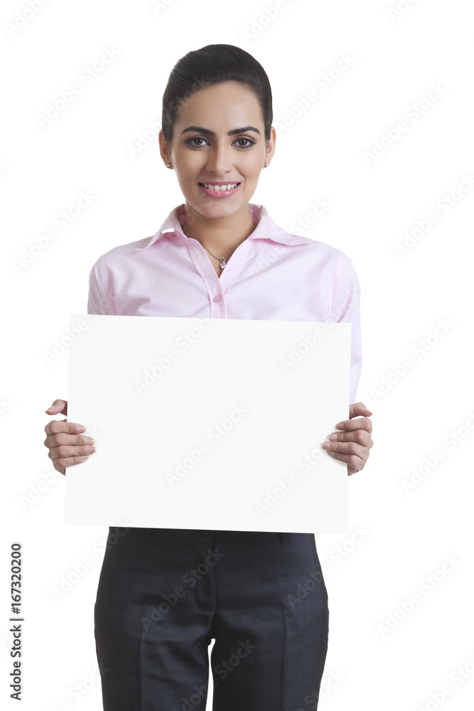 Portrait of happy young businesswoman holding blank board over white background Portrait of happy young businesswoman holding blank board over white background