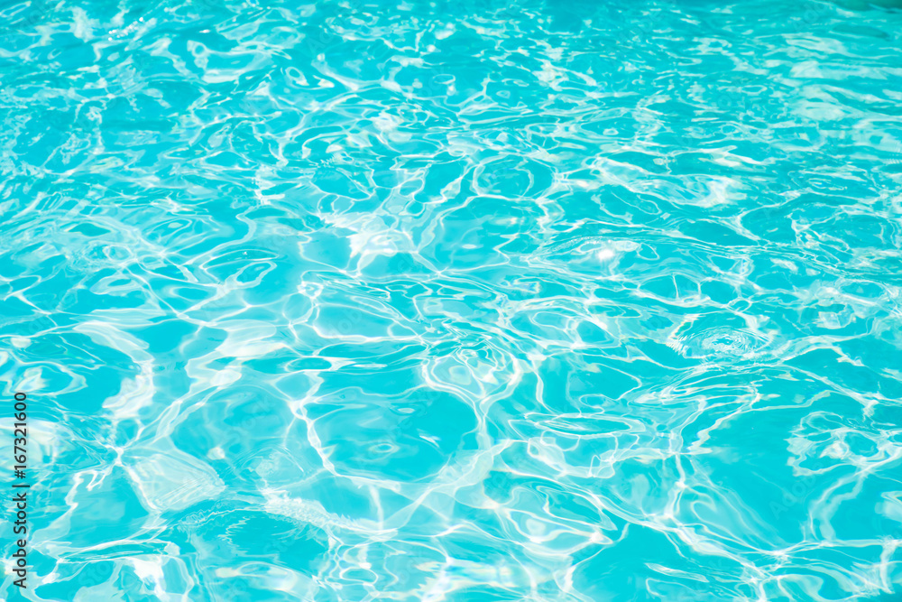 Blue and bright ripple water and surface in swimming pool , Beautiful motion gentle wave in pool Blue and bright ripple water and surface in swimming pool , Beautiful motion gentle wave in pool