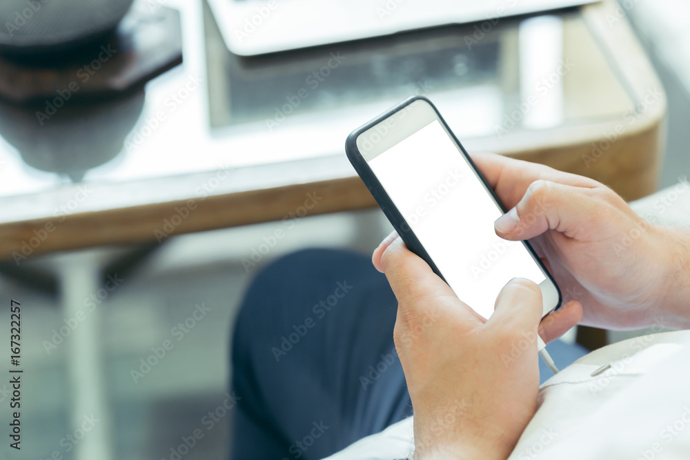 Man using smartphone at coffee shop Man using smartphone at coffee shop