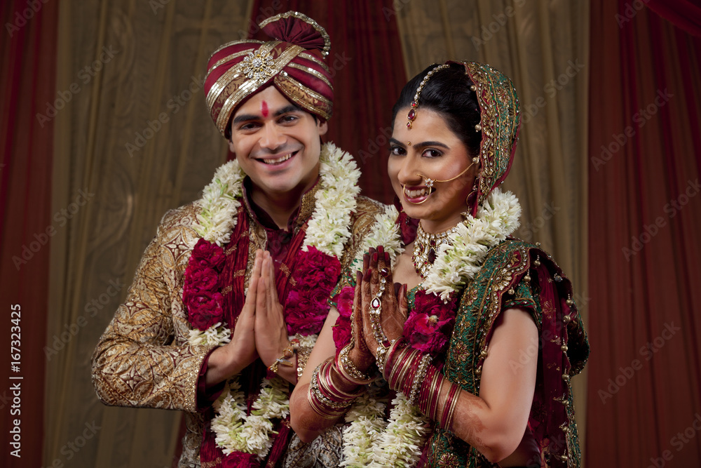 Couple greeting on their weeding day Couple greeting on their weeding day