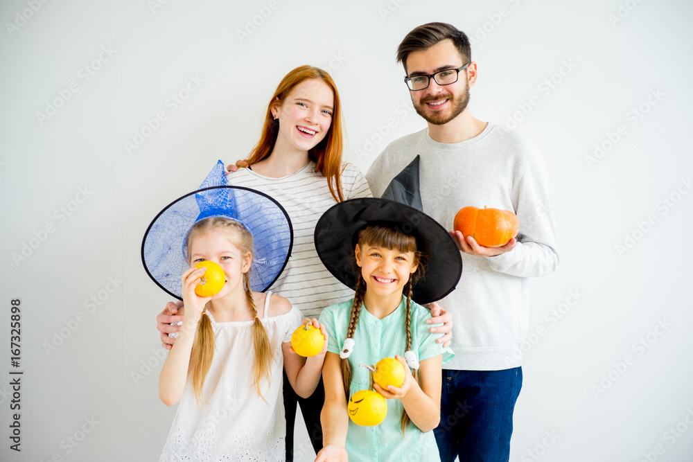 Family with pumpkins