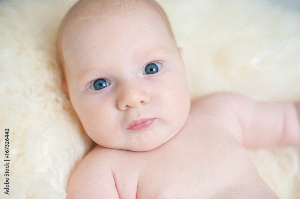 Child with big blue eyes surprised close-up Child with big blue eyes surprised close-up