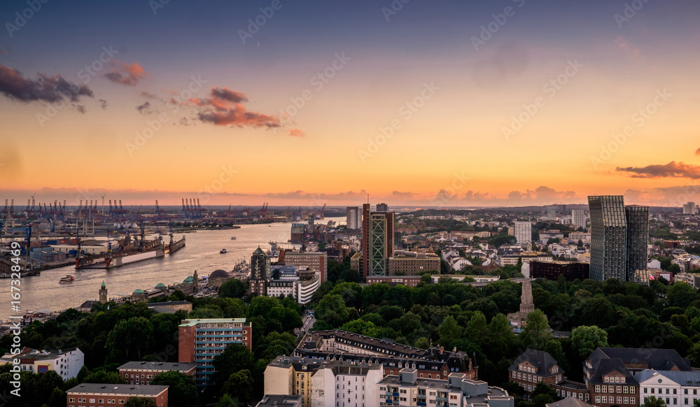 Sunset panorama of Hamburg city with harbor