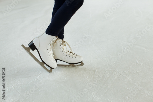 Feet in skates on ice