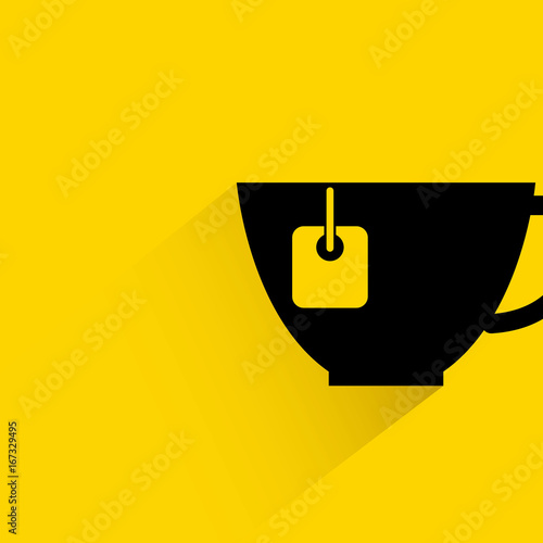 tea cup on yellow background
