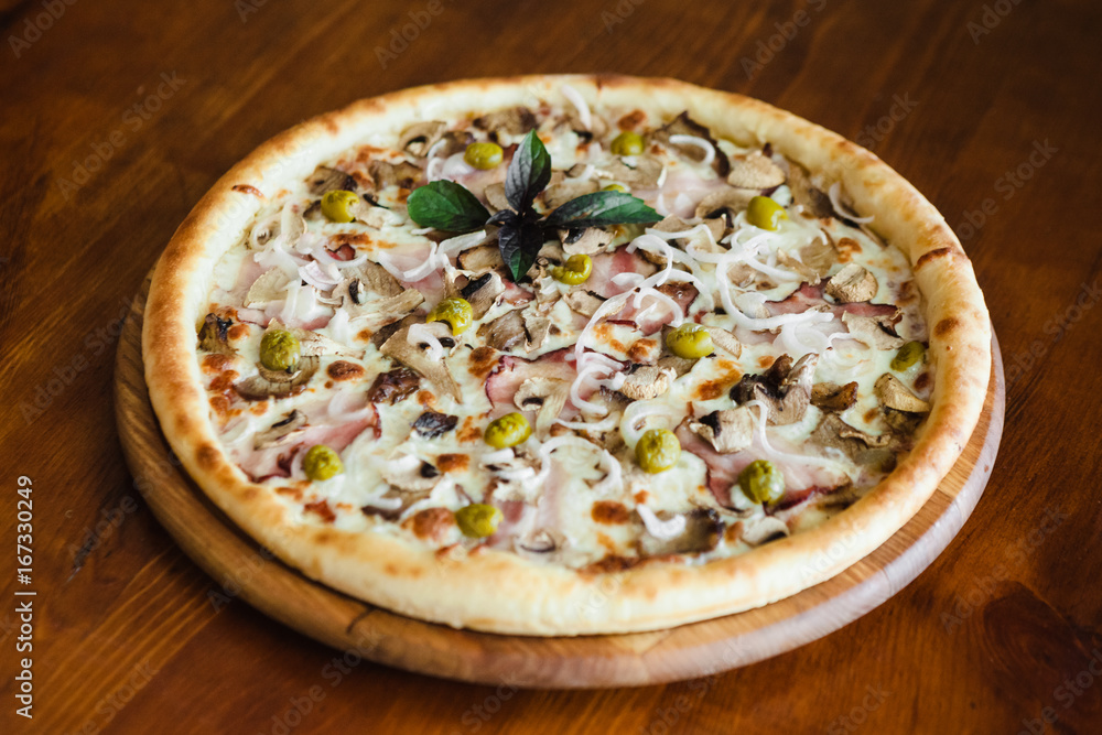 delicious pizza with meat, cheese and mushrooms delicious pizza with meat, cheese and mushrooms