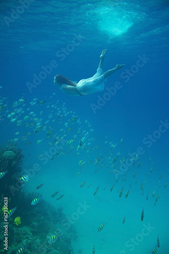 Girl in white underwater