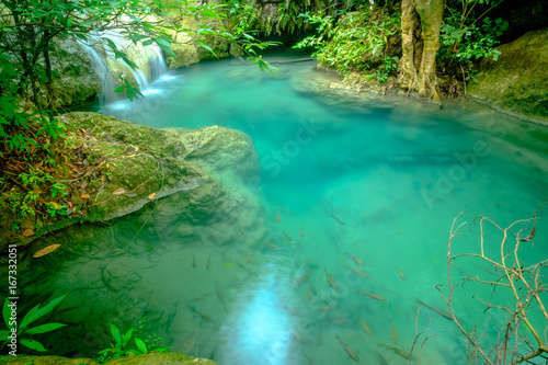Amazing beautiful deep forest waterfall in Erawan National Park, Kanchanaburi, Thailand