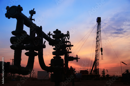 In the evening of oilfield pipeline silhouette